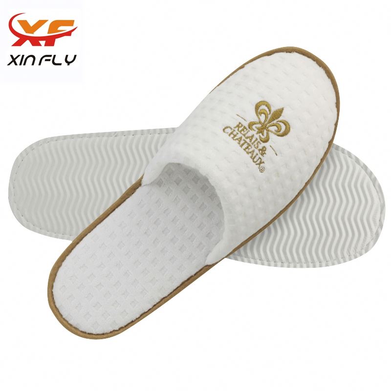 Venta al por mayor de zapatillas de hotel con punta abierta Guangzhou con logotipo personalizado