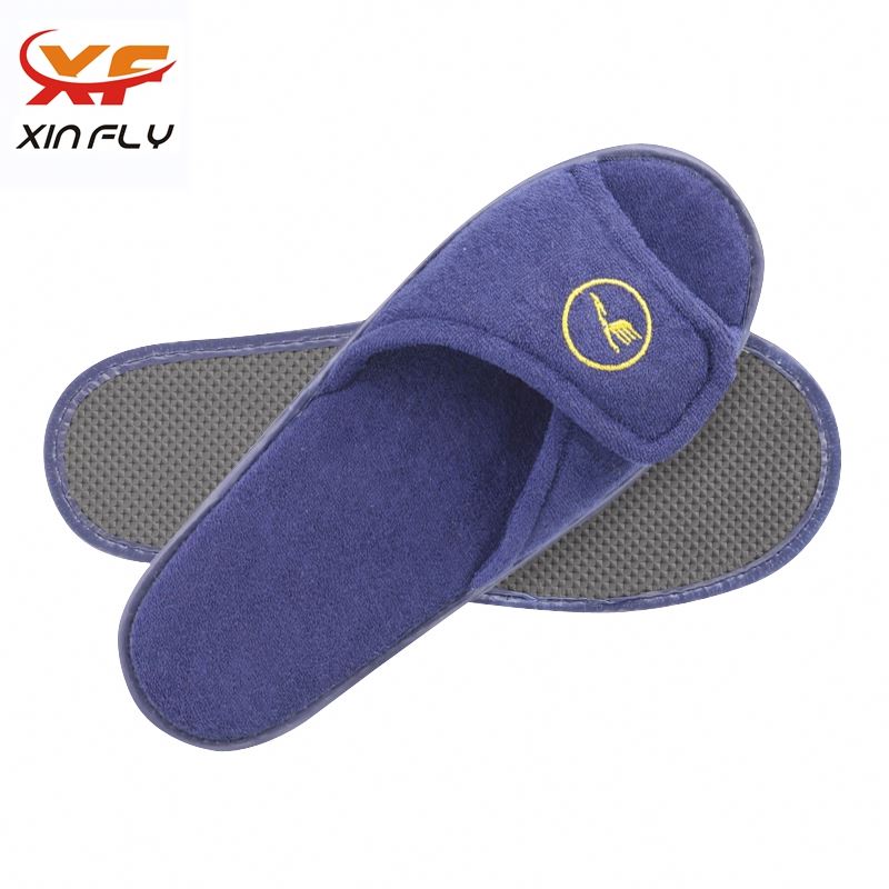 Zapatilla de hotel barata para spa con suela EVA de fábrica de Yangzhou para posada